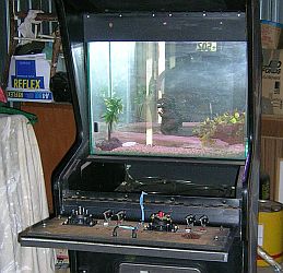 Closeup showing the fish tank with the control panel open