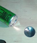 Aluminium can and a mounted button