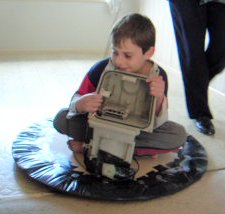My son on the hovercraft showing the vacuum cleaner air intake