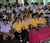 Students from Chom Thong school playing Multiplayer Guitar Hero