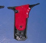 Broken glue-gun handgrip with acrylic trigger