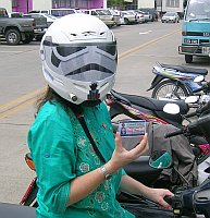 My wife wearing her Stormtrooper motorcycle helmet