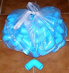 Bag of 64 PVC elbows.