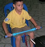 A friend's son playing GL-Tron with the PVC Tron controller