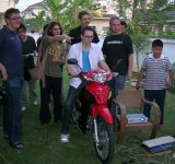 A Payap University student playing GL-Tron on a real motorbike